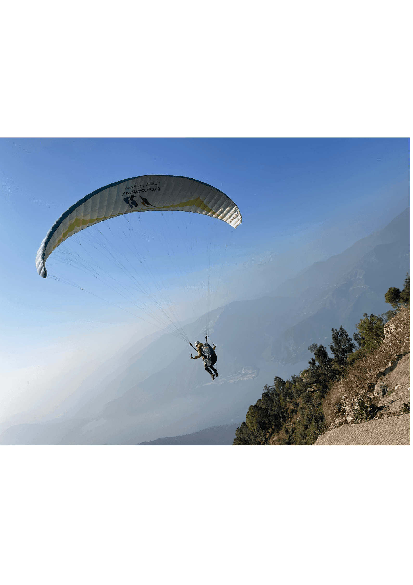 Tandem paraglider over Kamshet — the gift of flight