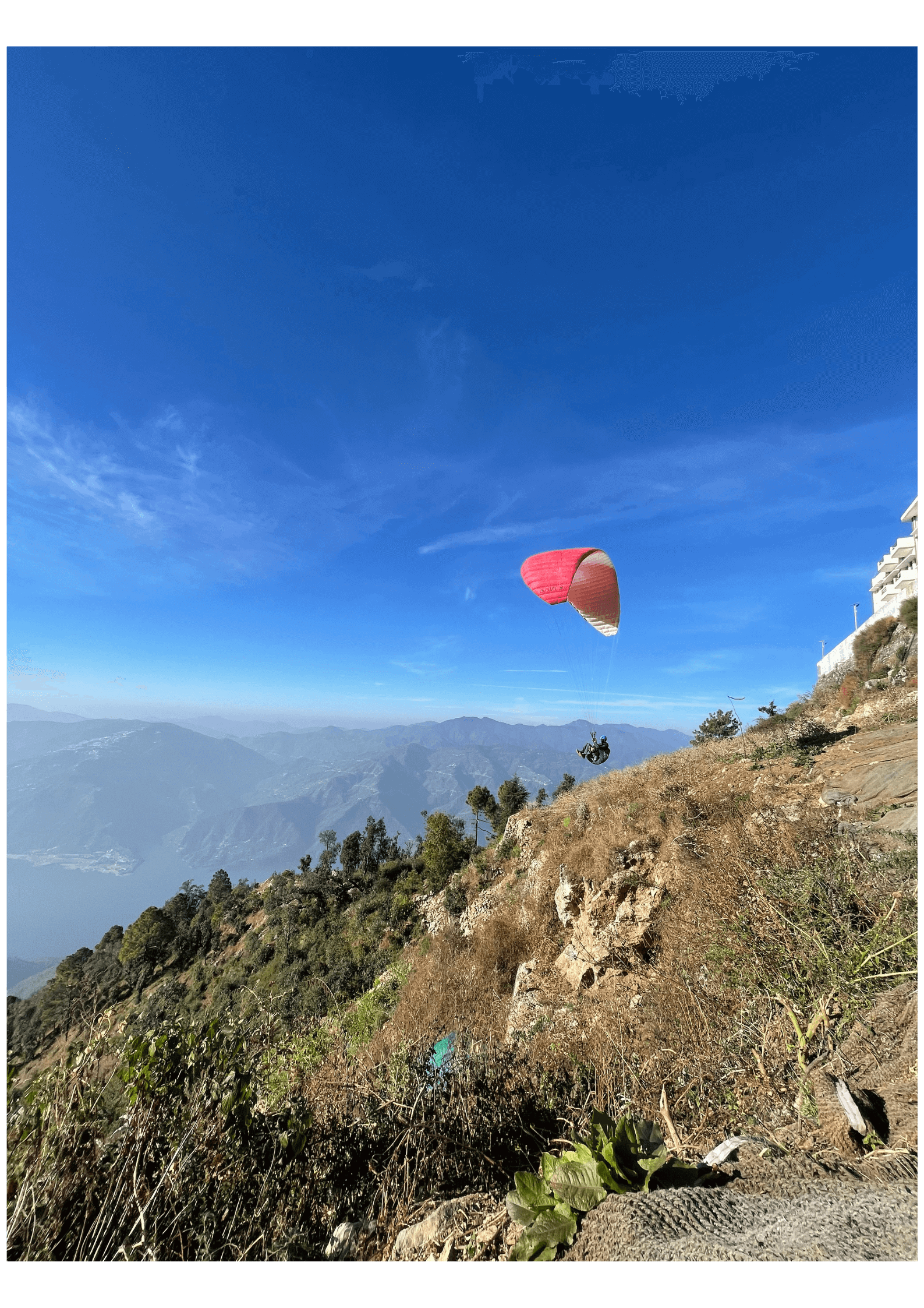 Scenic Pawna Lake view during paragliding sessions in Kamshet